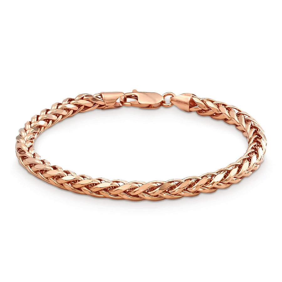 Rose gold classic wheat palm chain bracelet arranged in a full circle on white.
