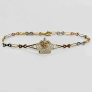 Gold Quinceañera crown bracelet with central crown charm and tri-color links.