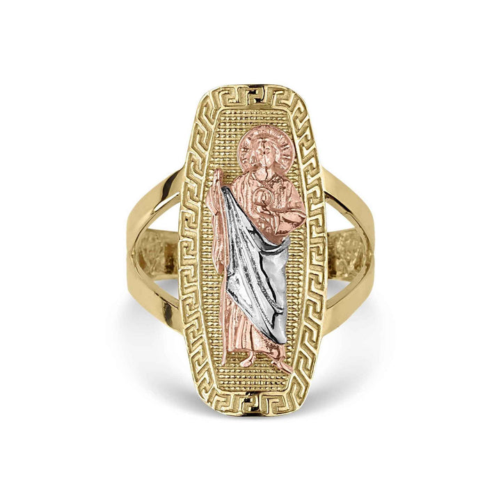 Tri-color gold San Judas Tadeo religious signet ring isolated on white background.