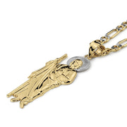 Close-up of a two-tone 10k or 14k gold San Judas pendant on a Figaro chain.