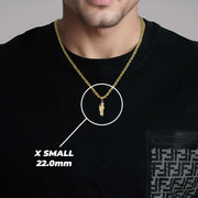 Model wearing a 22mm X Small two-tone gold Saint Jude pendant over a black shirt.