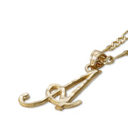 Gold cursive initial pendant necklace with diamond-cut finish on a gold chain.