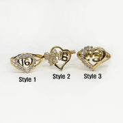 Three 10k - 14k gold heart shaped rings with number 16 design front view.