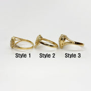 Three 10k - 14k gold Sweet 16 Heart rings side view with different styles.
