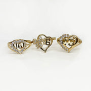 Three 10k - 14k gold heart shaped rings with number 16 designs.