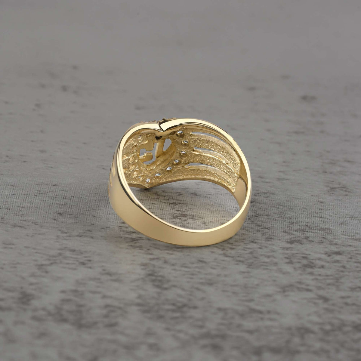 10k - 14k  gold ring with heart and number 16 design backview on a gray backgroud
