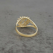 10k - 14k Gold ring with heart and number 15 design back view on a gray surface
