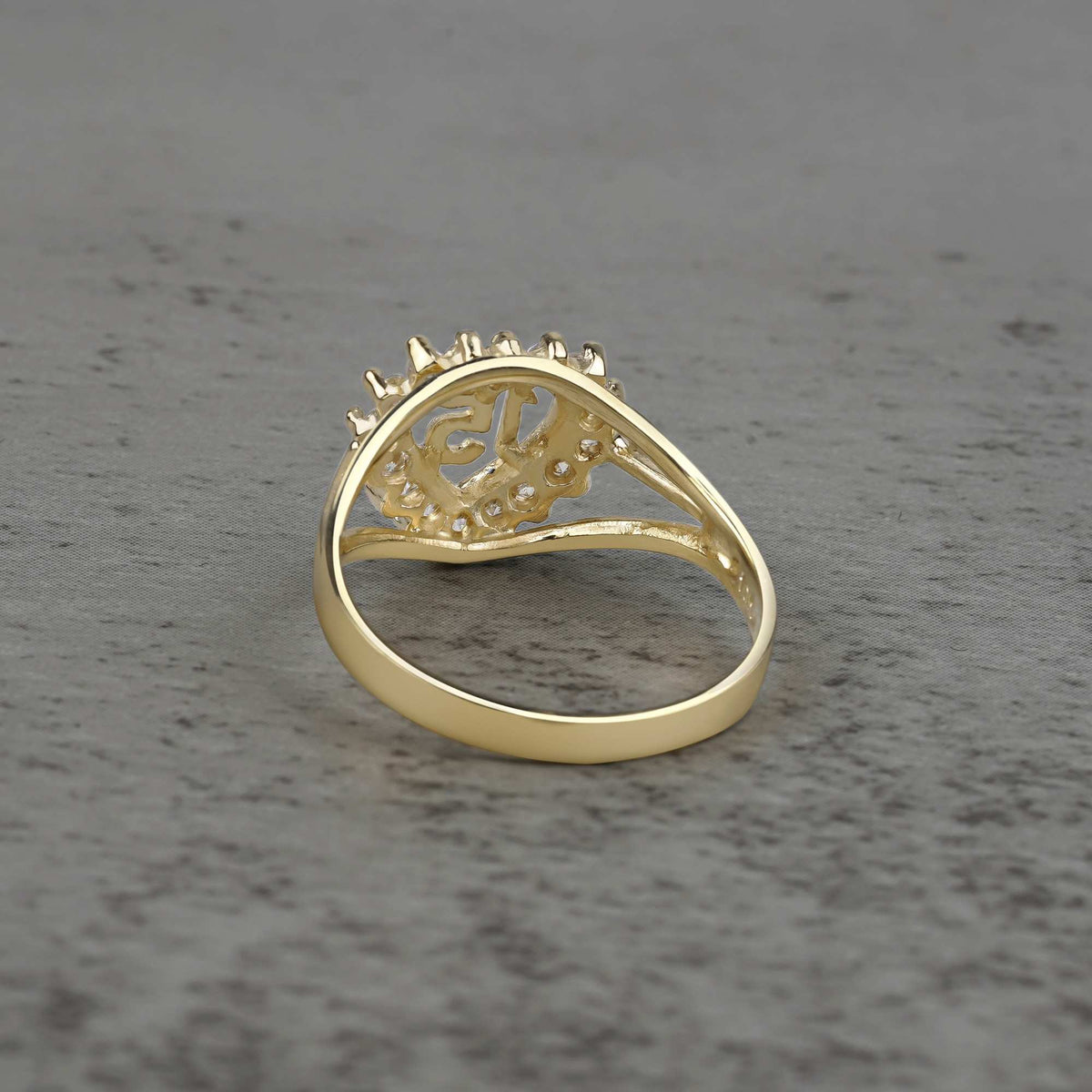 10k - 14k Gold ring with heart and number 15 design back view on a gray surface