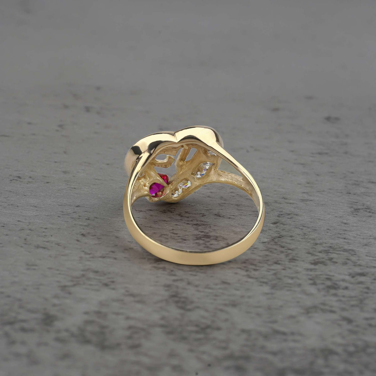 10k - 14k quinceanera gold ring with a red cubic zirconia back view 