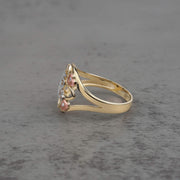 10k - 14k Gold ring with pink floral design side view 
