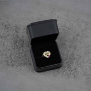 10k - 14k gold ring with a number 16  heart design and red cubic zirconia