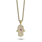 10k solid yellow gold Hamsa hand CZ evil eye pendant necklace on white background.