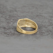 Reverse view of a gold square ring band revealing the textured under-gallery design.