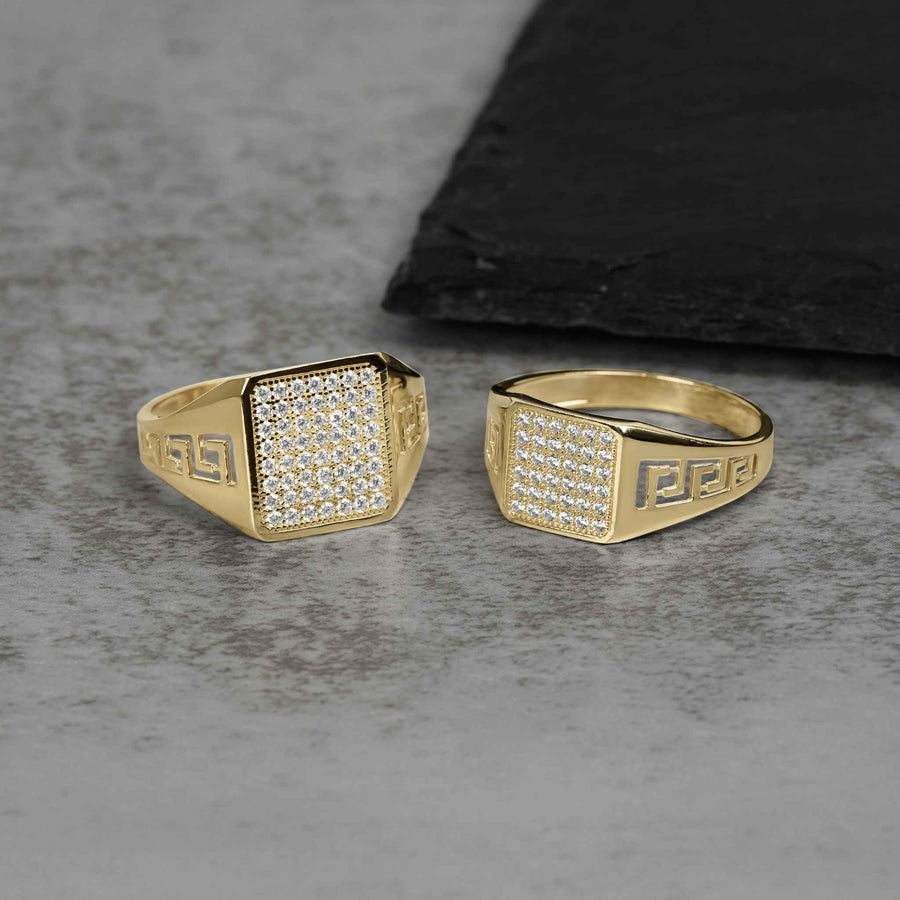 10k and 14k gold square signet Greek key rings with cubic zirconia.