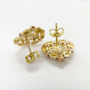 Reverse side of gold Lady of Guadalupe heart stud earrings with secure push-back closures.
