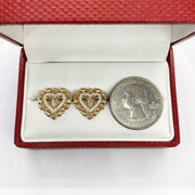 10k and 14k gold Virgin Mary heart earrings with cubic zirconia and a U.S. quarter.