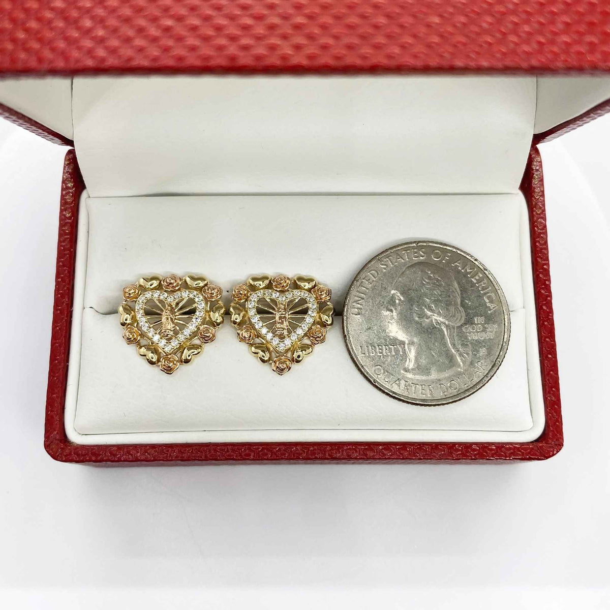 10k and 14k gold Virgin Mary heart earrings with cubic zirconia and a U.S. quarter.