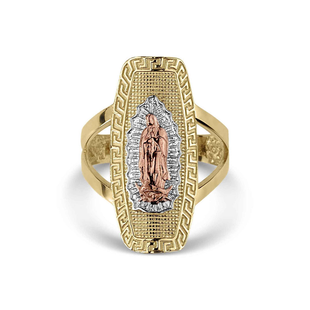 Tri-color gold Virgin Mary Guadalupe religious signet ring isolated on white background.
