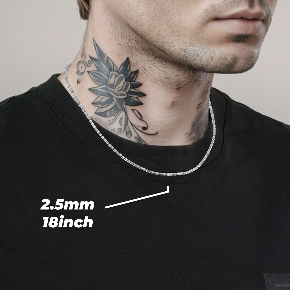 Man wearing a 2.5mm 18inch white gold classic ice chain necklace.
