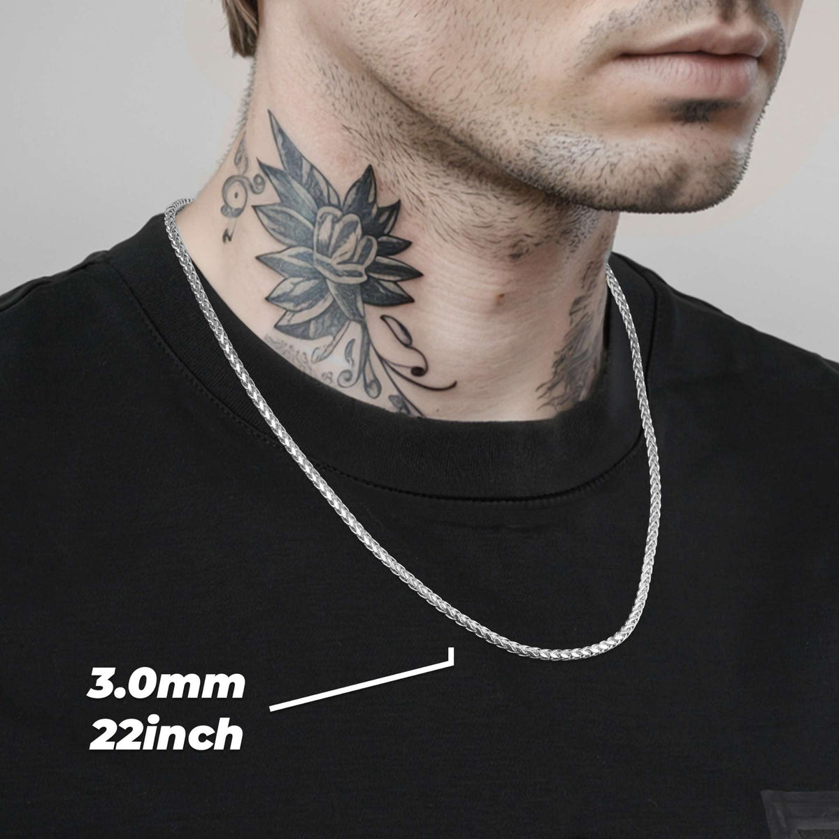 Man wearing a 3.0mm 22inch white gold classic wheat palm chain necklace.