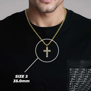 Model wearing a gold chain with the 35.0mm Yelca crucifix pendant highlighted in white.