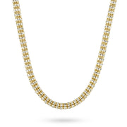 10k and 14k yellow gold two-tone classic ice chain necklace on white background.