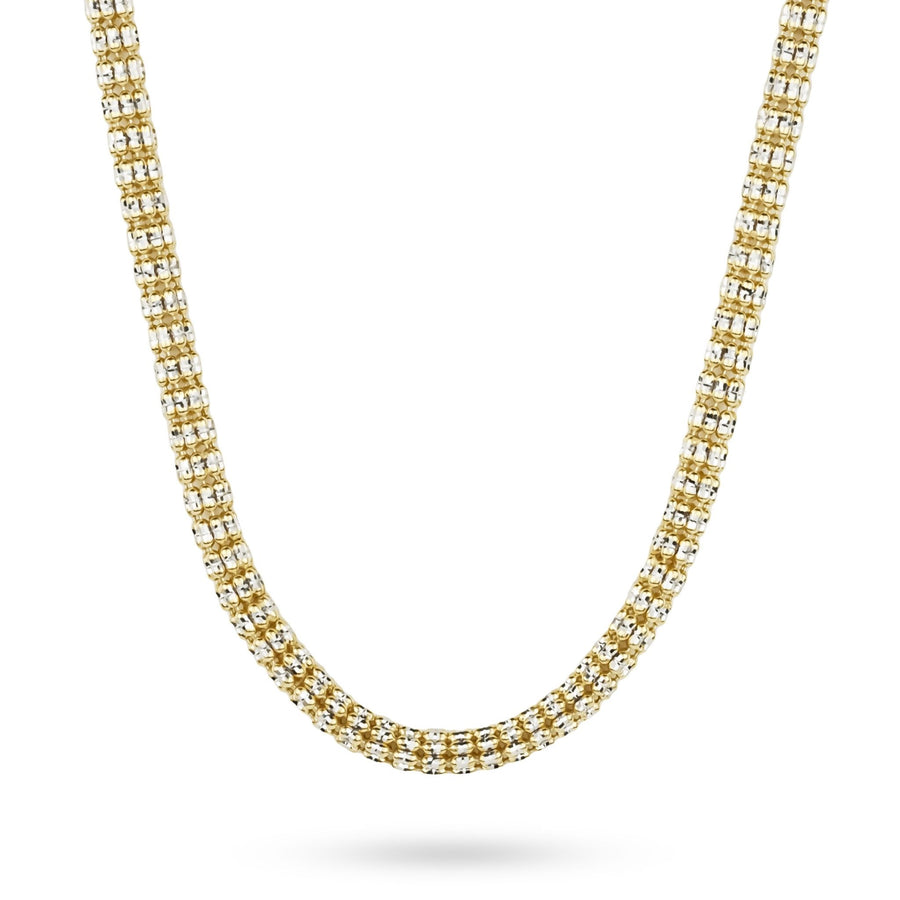 10k and 14k yellow gold two-tone classic ice chain necklace on white background.