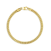 Yellow gold classic ice chain bracelet arranged in a full circle on white.