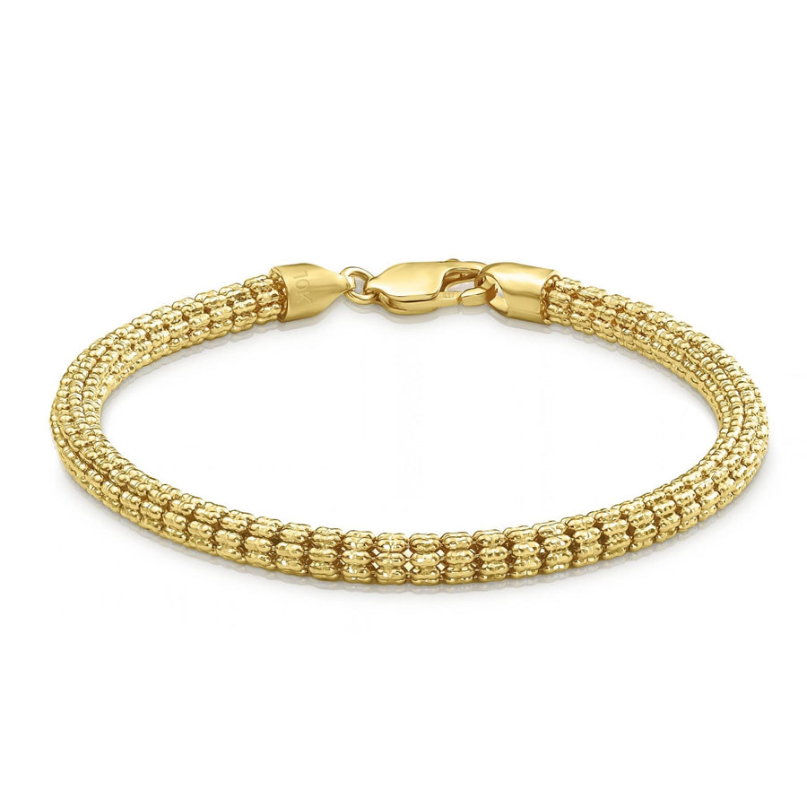 Yellow gold classic ice chain bracelet arranged in a full circle on white