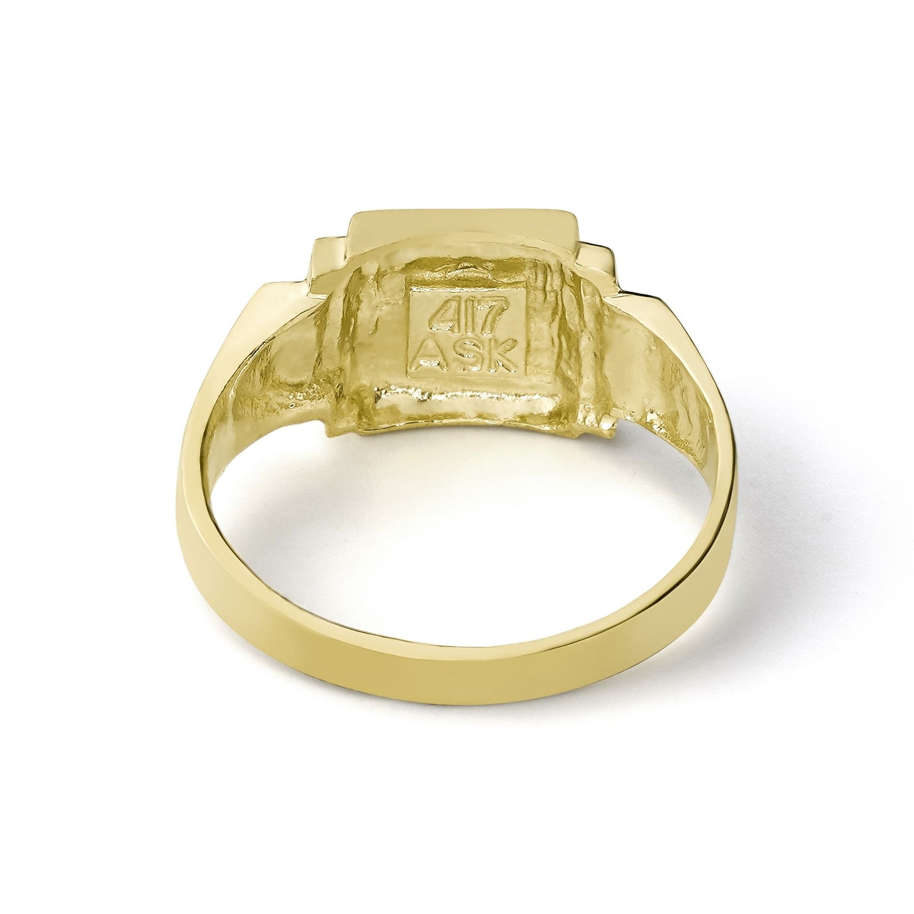 Gold initial ring interior showing the textured underside and stamp on white background.