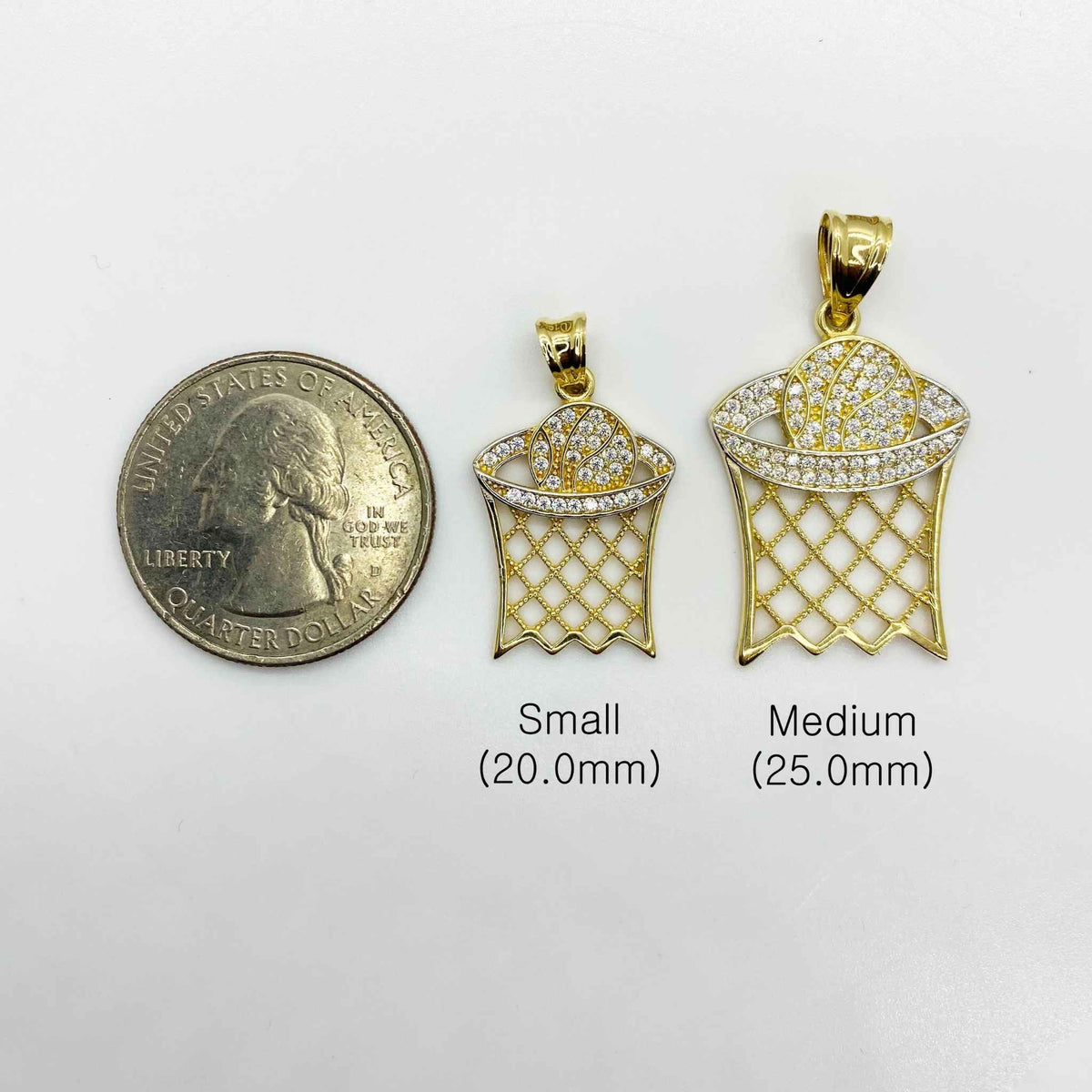 Size comparison of small 20.0mm and medium 25.0mm gold basketball hoop pendants next to a quarter.