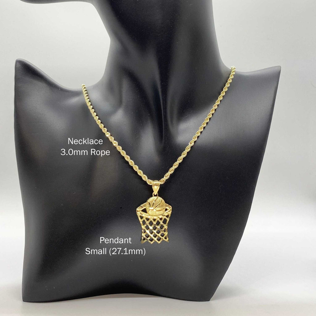 Small 10k gold basketball hoop pendant on a 3.0mm rope chain displayed on a black mannequin bust.