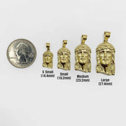 Four sizes of 10k gold Jesus Face pendants displayed alongside a US quarter.