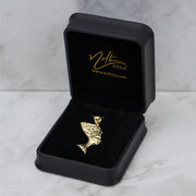 Profile view of 10k gold Queen Nefertiti pendant packaged in a black display box.