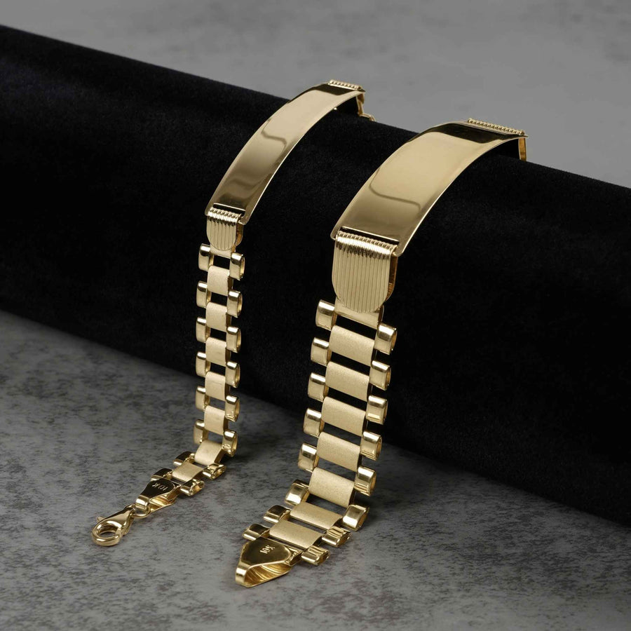 Close-up of 10k yellow gold classic Rollie link personalized ID bracelets showing different width options.