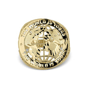 Close-up of a 10k gold round ring head with "The World Is Yours" text.
