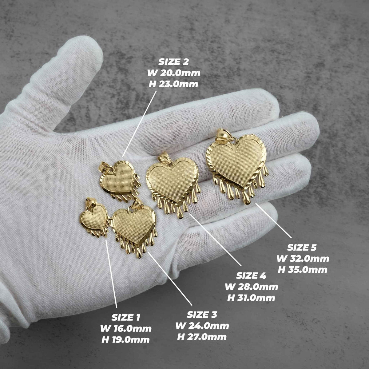 Size chart of five 10k gold dripping heart pendants held on a gloved hand.