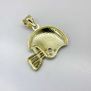 Back view of a 10k yellow gold football helmet pendant showing its hollow design.