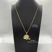 Gold football helmet pendant necklace shown on a black display bust.