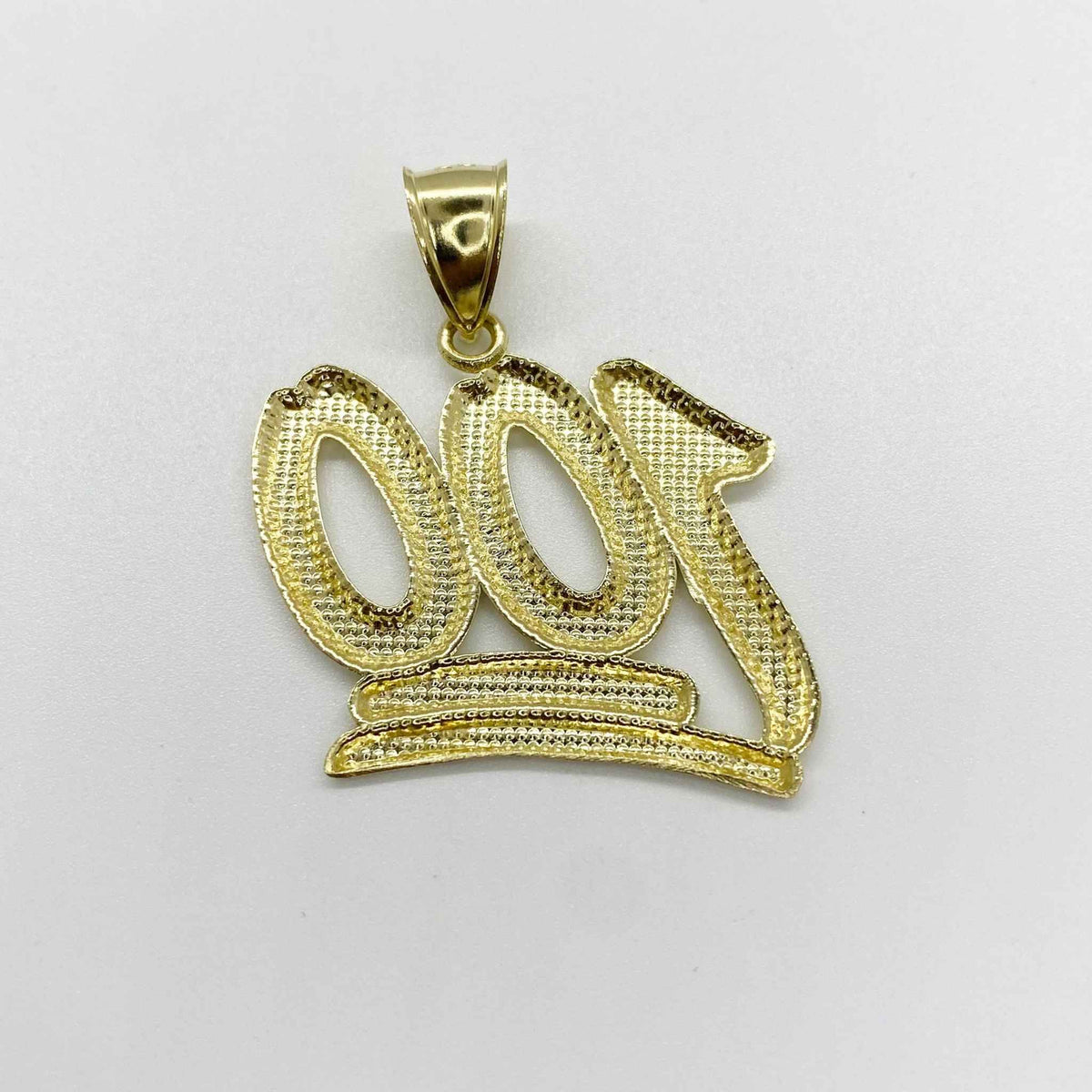 Rear view showing the structural mesh back and bail of a gold 100 pendant.