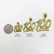 Three gold 100 emoji pendants in small, medium, and large next to a quarter.