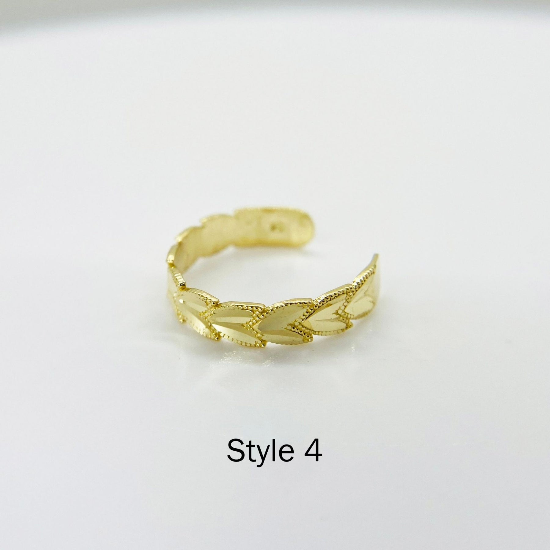 10k Gold Dainty Toe Ring on a white background with Style text.