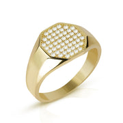 "Gold signet ring featuring a hexagonal top covered in brilliant white stones.