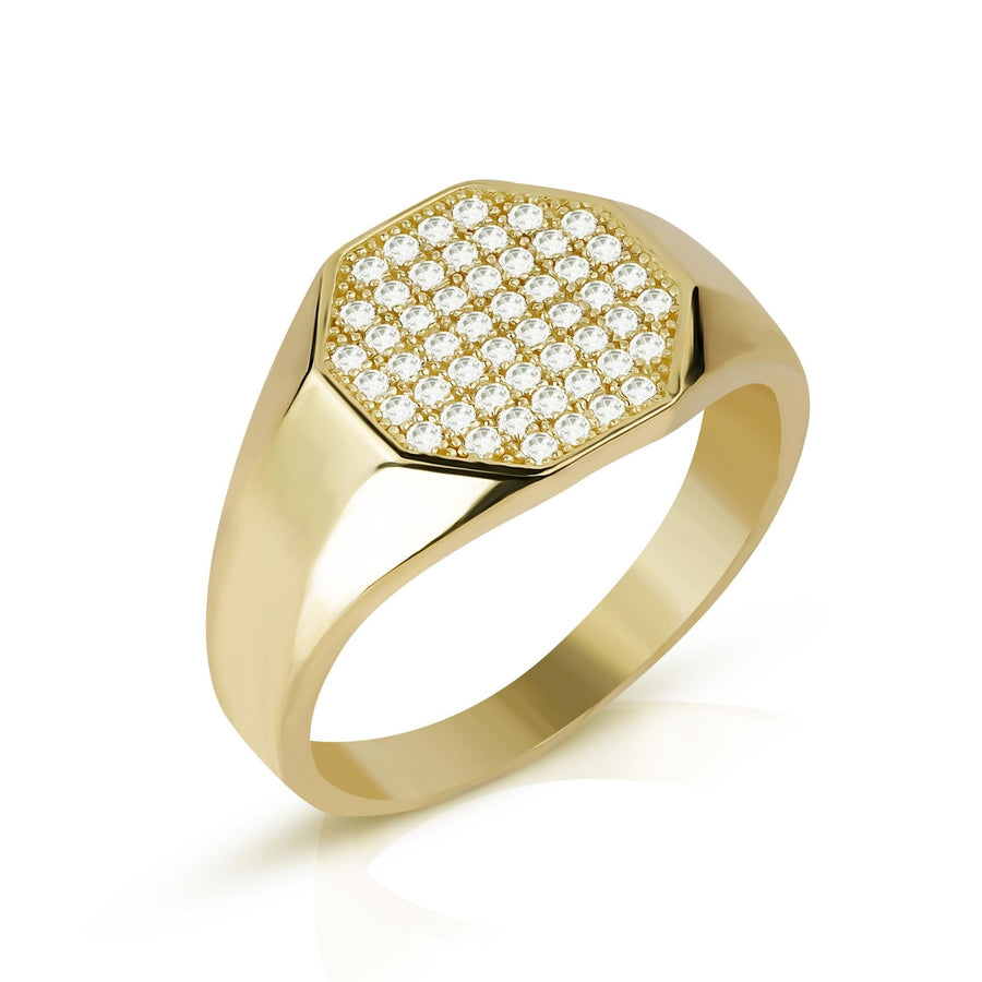 "Gold signet ring featuring a hexagonal top covered in brilliant white stones.