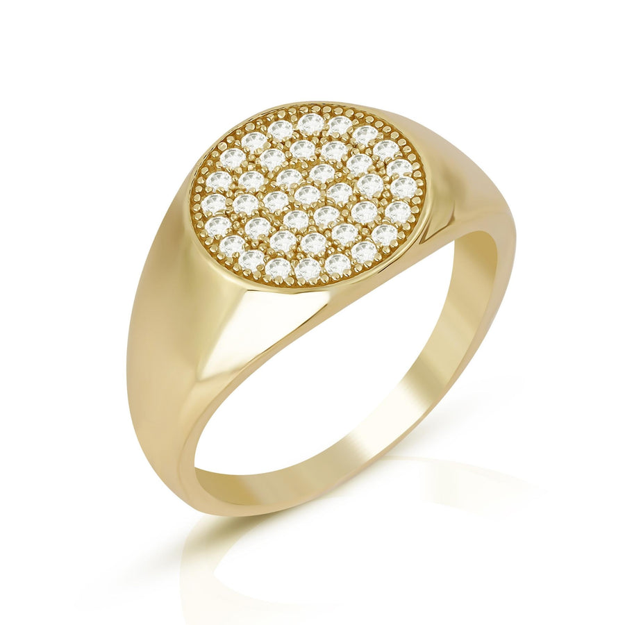A polished gold signet ring with a brilliant, diamond-cut circular arrangement of cubic zirconia.