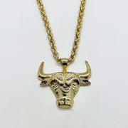 10k solid gold bull Taurus head pendant displayed on a matching gold rope chain.