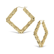 Pair of 10k yellow gold bamboo hoop earrings featuring a unique rhombus shape.