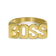Front-facing view of a 10k yellow gold ring spelling BOSS on white background