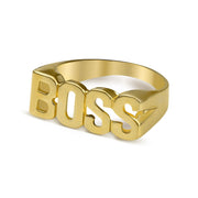Angled view of a 10k gold BOSS block letter ring on white background.