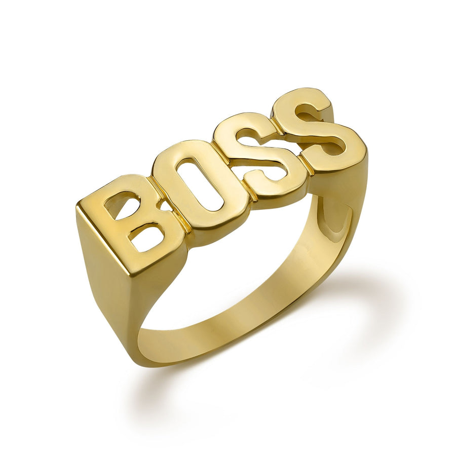 10k yellow gold ring with block letters spelling BOSS on white background.